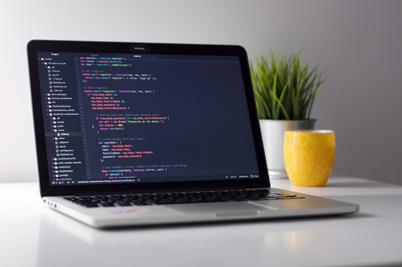 Developer workstation with code on screen